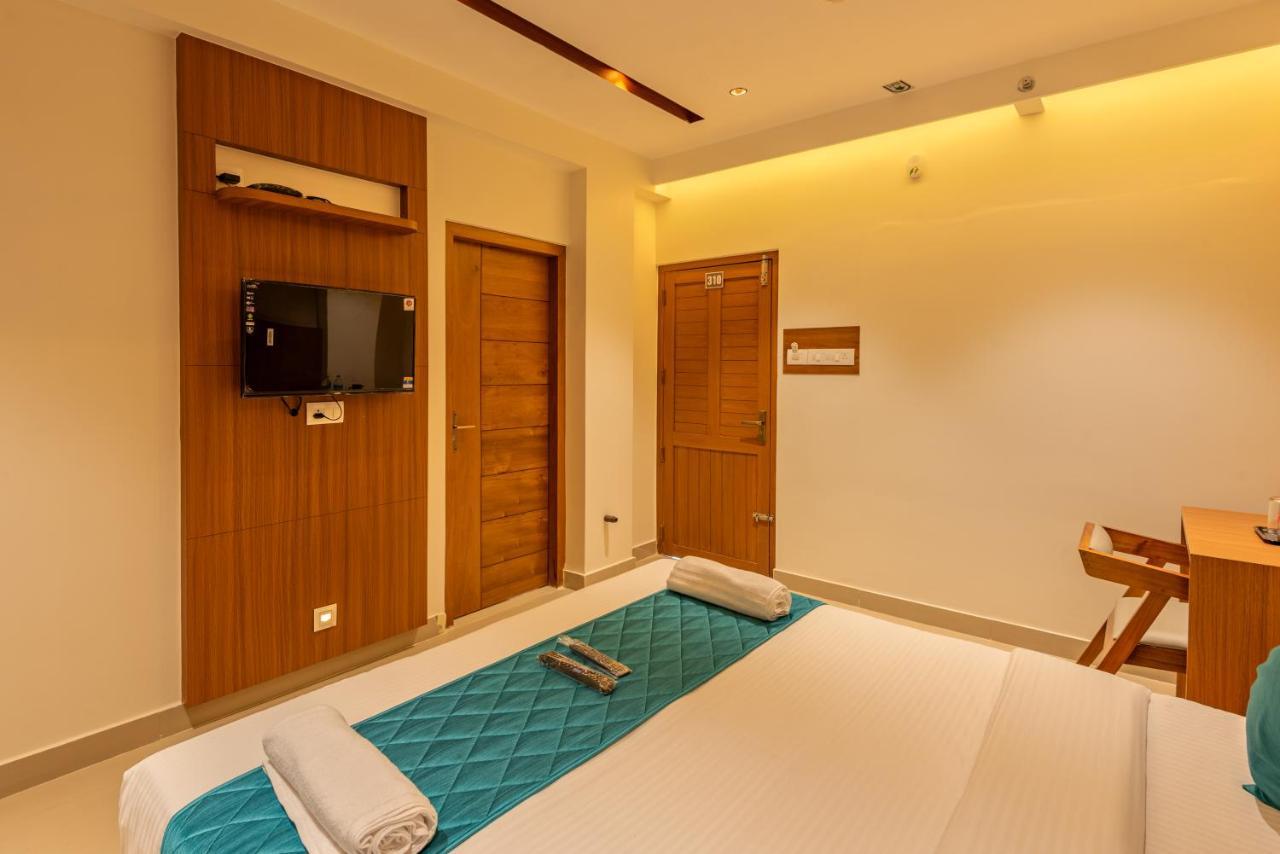 Hotel Stay Bella 科泽科德 外观 照片