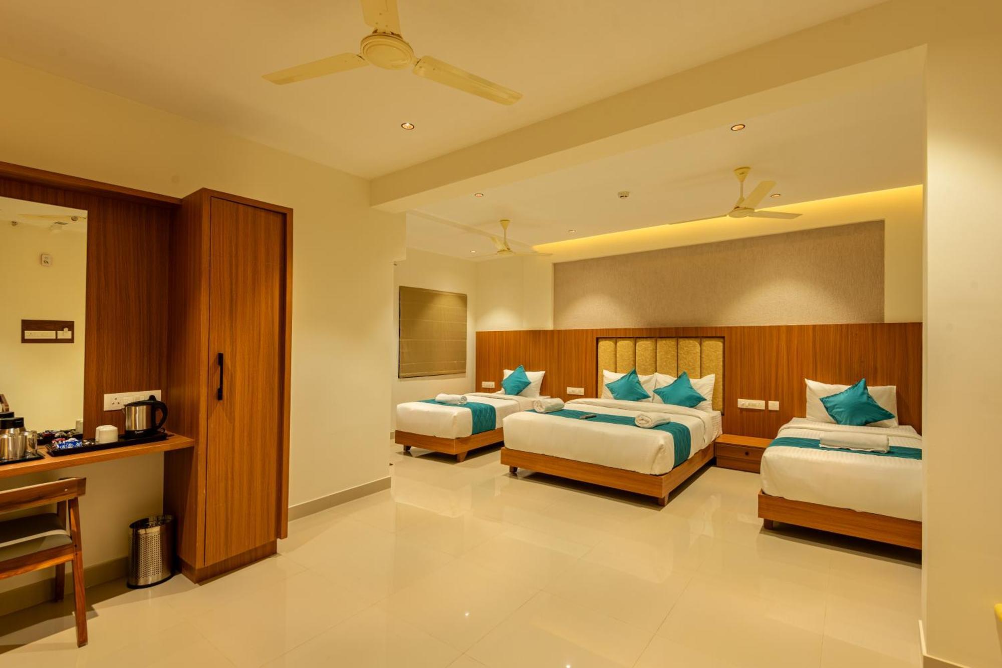 Hotel Stay Bella 科泽科德 外观 照片